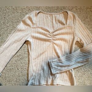 Small than long sleeve shirt. Like new.